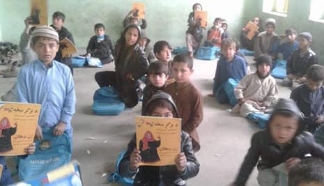 Afghan kids with Hoopoe in a classroom