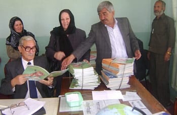 Afghan teachers reviewing Hoopoe Books
