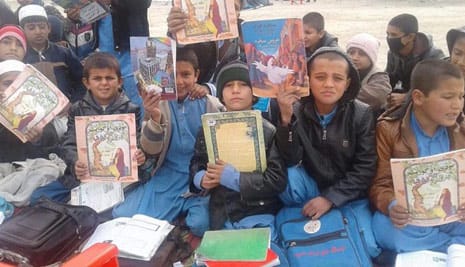 Afghan kids with Hoopoe books