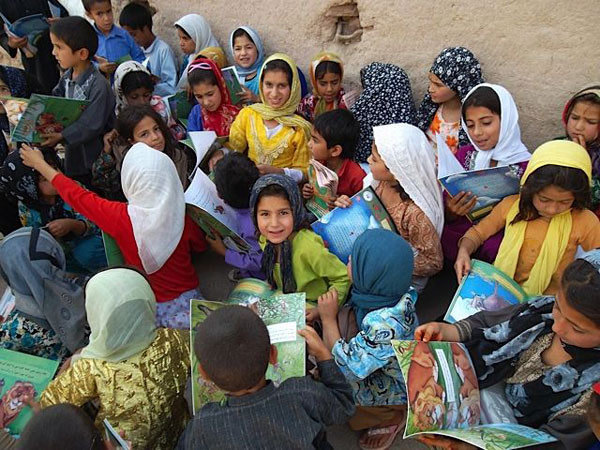 Afghan Kids in a colorful group with Hoopoe Books