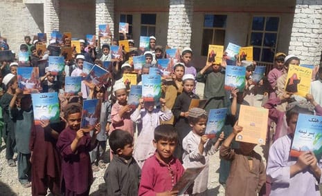 Afghan boys from the Daman district in Afghanistan with Hoopoe books