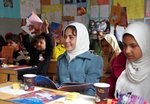 Afghan girls in the classroom with Hoopoe books