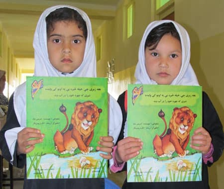 2 Afghan girls with their new Hoopoe Books