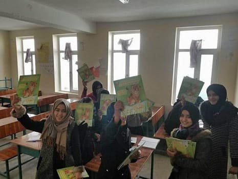 Afghan girls in classroom with Hoopoe books